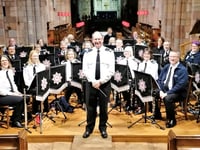 £300 for Church Fund from Fire and Rescue Band and Choir Concert
