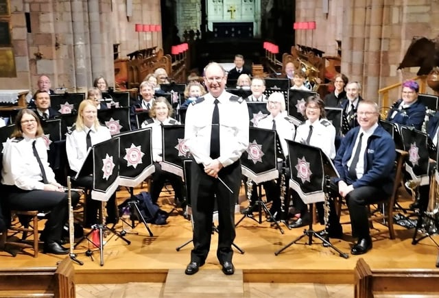£300 for Church Fund from Fire and Rescue Band and Choir Concert
