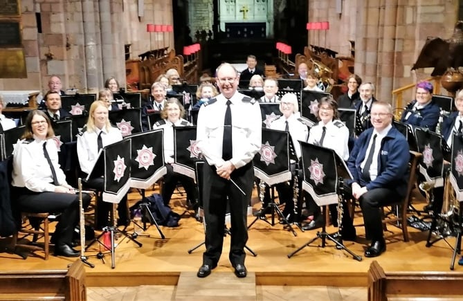 Devon and Somerset Fire and Rescue Concert Band with conductor Steve Herbert in Crediton Parish Church.