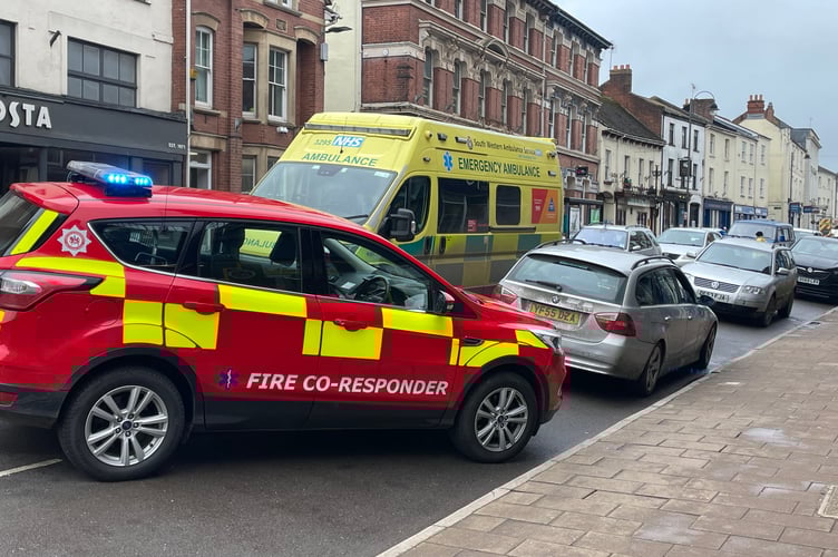 Emergency vehicles in Crediton High Street.  AQ 5244