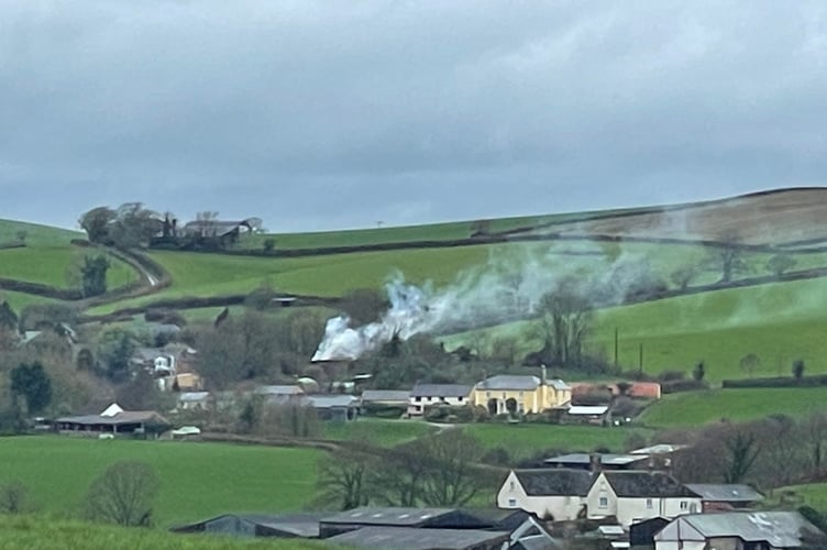 The smoke rising from the fire at West Sandford.  AQ 5391