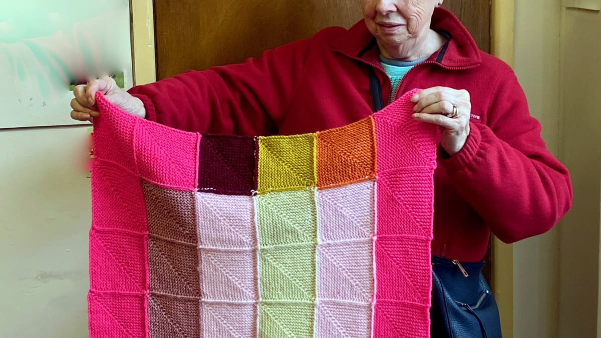 Joan has been knitting blankets for Battersea Dogs and Cats Home creditoncourier.co.uk
