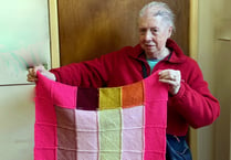 Joan has been knitting blankets for Battersea Dogs and Cats Home