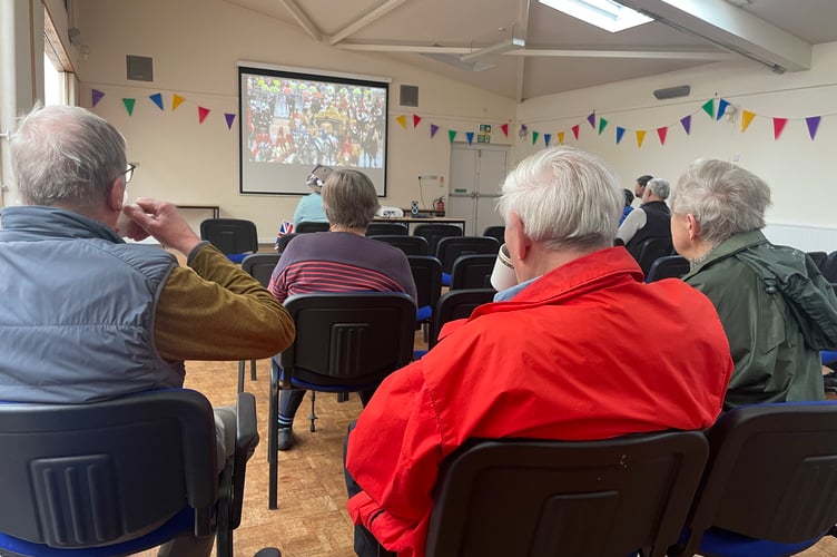 Watching the Coronation in the Boniface Centre. AQ 7614