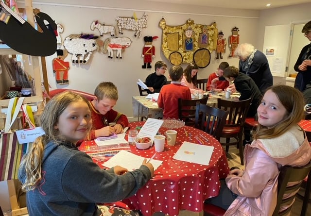 Wording and photographs from the hot chocolate and cake evening held at the ARK, where some Lapford Youth Club members enjoyed being with their Coronation artwork.