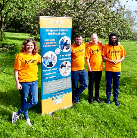From left: Becky Fry, Fundraising Manager, Amber Foundation Devon, along with three young people from Amber, Kian, Byron and Shakeil.