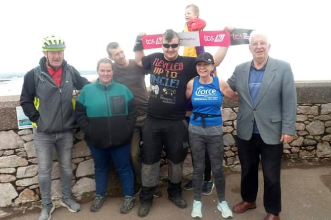 Margaret with some of her support team at the halfway point at Dawlish Warren during her virtual London Marathon. 