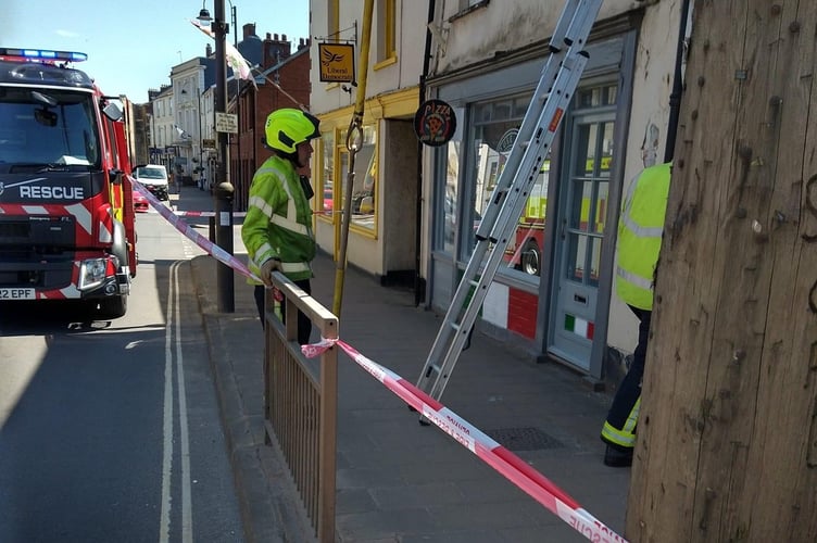 Danes Castle Exeter Blue Watch crew which came to Crediton to inspect and make safe the potentially dangerous structure in Crediton High Street at the weekend.