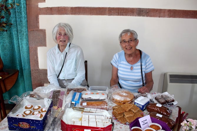 On the cake stall were Gill Ware (left) and Rita King.  SR 7942