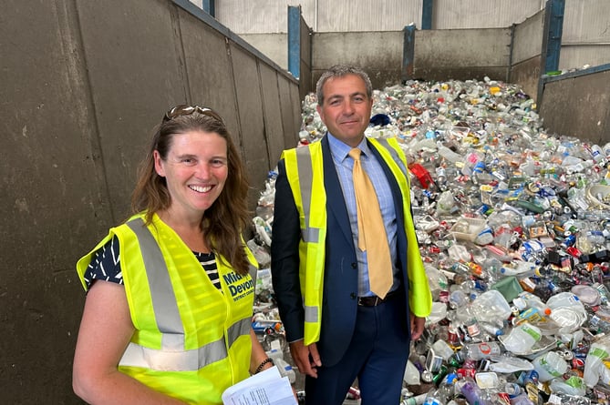 Councillor Natasha Bradshaw, Cabinet Member for Climate Change and Councillor Josh Wright, Cabinet Member for Environment and Services with less than half-a-day’s worth of recycled plastic packaging and tins/cans/foil at the Council’s Carlu Close depot.