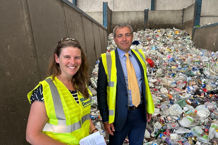 Councillor Natasha Bradshaw, Cabinet Member for Climate Change and Councillor Josh Wright, Cabinet Member for Environment and Services with less than half-a-day’s worth of recycled plastic packaging and tins/cans/foil at the Council’s Carlu Close depot.