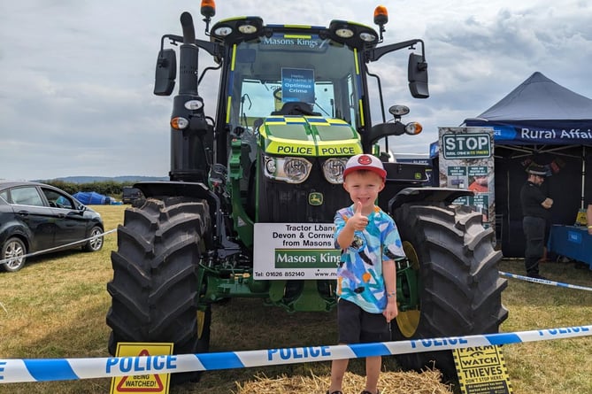 Reuben gives the thumbs after he won the Devon and Cornwall Police 'Name Our Tractor' competition.