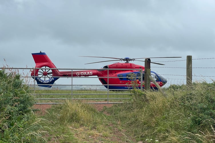 The Devon Air Ambulance in a field close to the scene.  2002