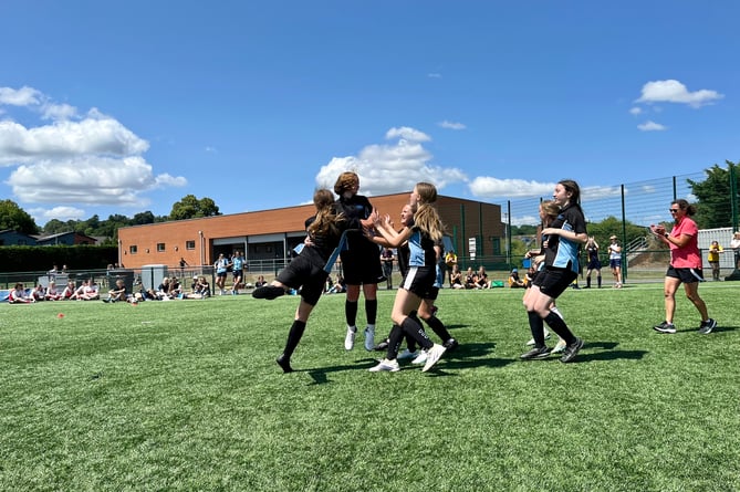 In action during the girls football tournament.
