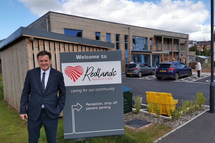 Mel Stride outside Redland Surgery in Crediton.