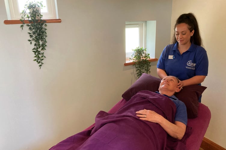 Kayleigh Brown with a client.