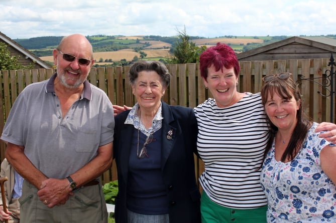 In the garden, left to right, Bert Jewell, Paddy Dornom (vice chairman Redlands Friends), Karen Hoskins (Redlands assistant Practice Manager) and Louise Reed (Lead Dispenser Thorverton branch).  SR 8545