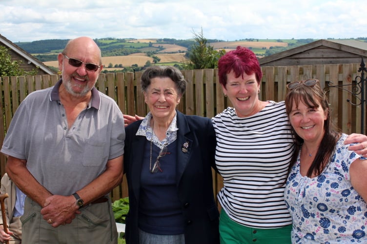 In the garden, left to right, Bert Jewell, Paddy Dornom (vice chairman Redlands Friends), Karen Hoskins (Redlands assistant Practice Manager) and Louise Reed (Lead Dispenser Thorverton branch). SR 8545