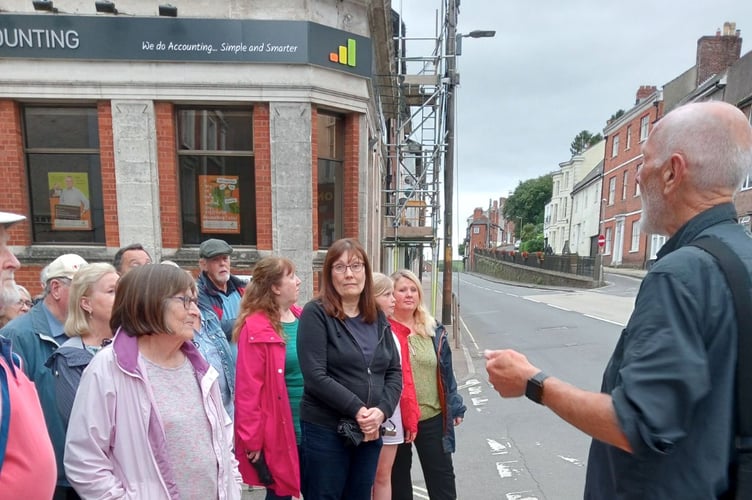 During the ‘Fire Walk’ through Crediton.
