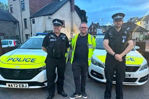 Cllr Luke Taylor and Mid Devon Police officers.
