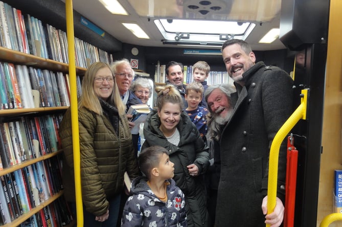 Erica Eden took this photo in April this year on the Mobile Library in Zeal Monachorum, including the librarian, front right.