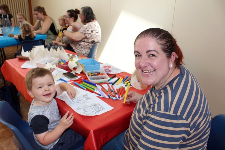 Making party hats and colouring. SR 8440