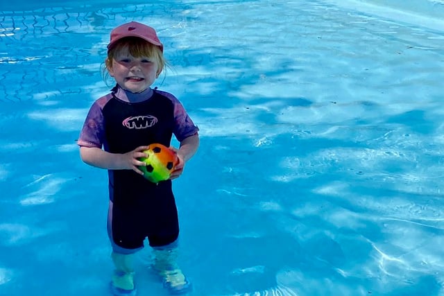 One of the first youngsters in the paddling pool when it opened for the summer in Newcombes Meadow.  NP 260523 01