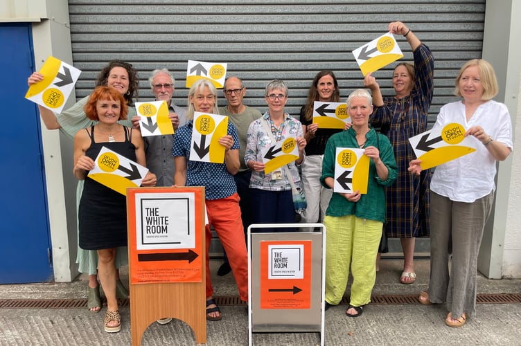 Most of the artists and makers who have work displayed at The White Room Creative Space in Crediton as part of the Devon Open Studios, with host, Bindy Saywood, left. AQ 6365