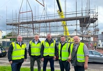 Pre-built homes arrive onsite as social housing development nears completion