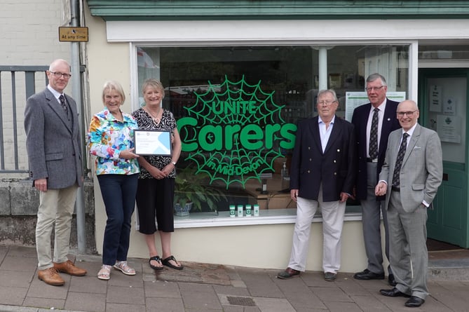 Outside the Tiverton offices of Unite Carers in Mid Devon, left to right: Tim Golder (Asst Provincial Grand Master Devonshire Freemasons), Bernice Philbrick (Chair of Trustees, Unite Carers), Sharon Trerice (General Manager, Unite Carers), Paul Fitzmaurice (Trustee, Unite Carers), Clive Eden (Communications Officer, Devonshire Freemasons) and Anthony Eldred (Charity Steward, Devonshire Freemasons).           