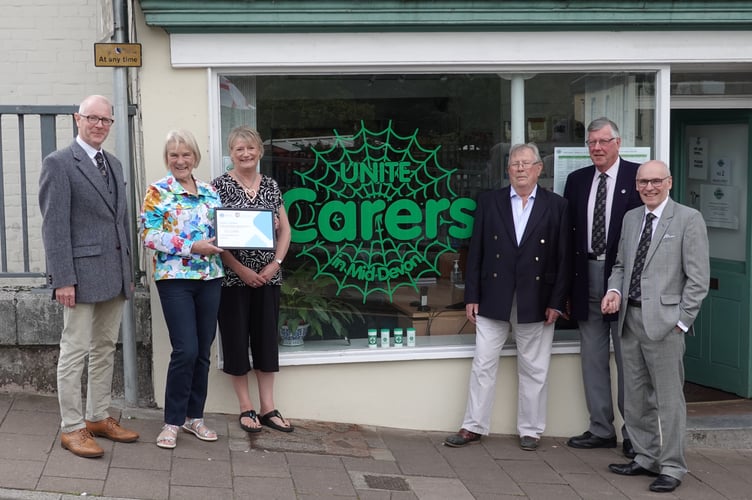 Outside the Tiverton offices of Unite Carers in Mid Devon, left to right: Tim Golder (Asst Provincial Grand Master Devonshire Freemasons), Bernice Philbrick (Chair of Trustees, Unite Carers), Sharon Trerice (General Manager, Unite Carers), Paul Fitzmaurice (Trustee, Unite Carers), Clive Eden (Communications Officer, Devonshire Freemasons) and Anthony Eldred (Charity Steward, Devonshire Freemasons).