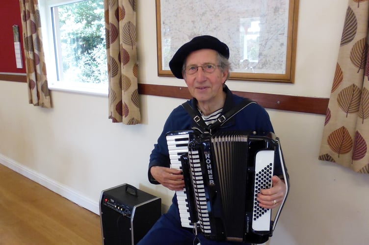 John Wilson with his accordion.