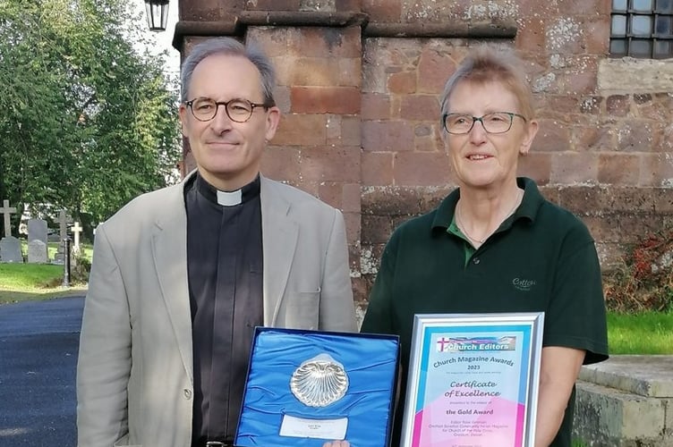 Rev Preb Matthew Tregenza and Crediton Parish Magazine Editor Rose Grisman with the award. Photo courtesy of Peter Brewer