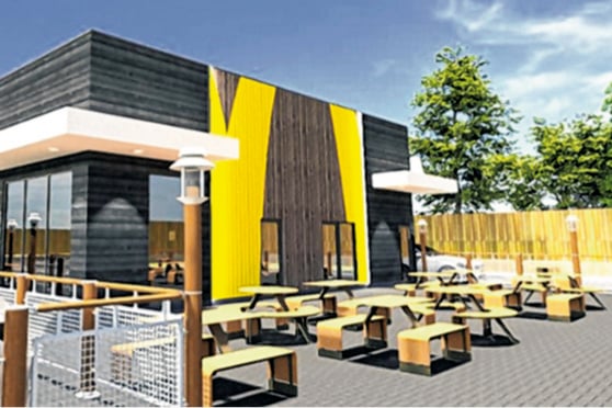 An example of the style of McDonald’s restaurant and drive-thru proposed for Crediton but which now it is proposed will be built with a red brick exterior and smaller M design.  Image: McDonald’s planning documents