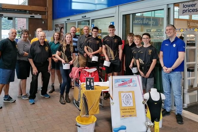 Crediton and District Swimming Club members during their bag packing session at Crediton's Tesco superstore.