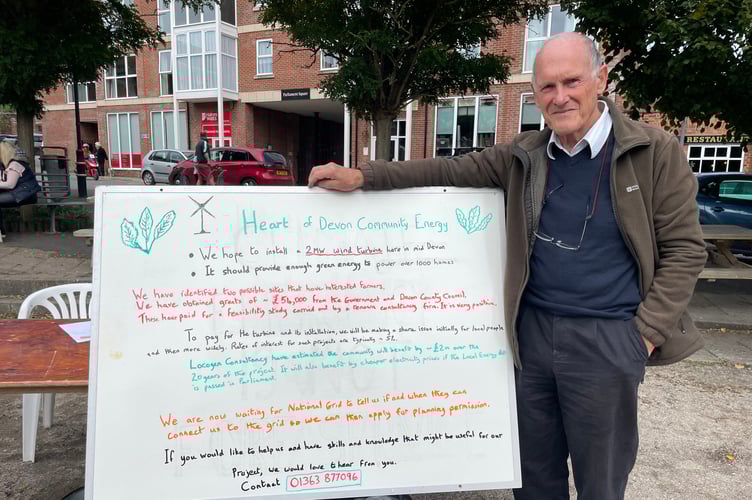 John Chater with his display about plans to install a one Megawatt community-owned wind turbine in the region. AQ 7803