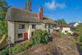 Farmhouse for sale backs onto countryside and is nearly 500 years old