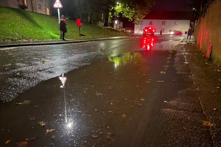 The flooded road in Belle Parade, Crediton on October 19. AQ 9193
