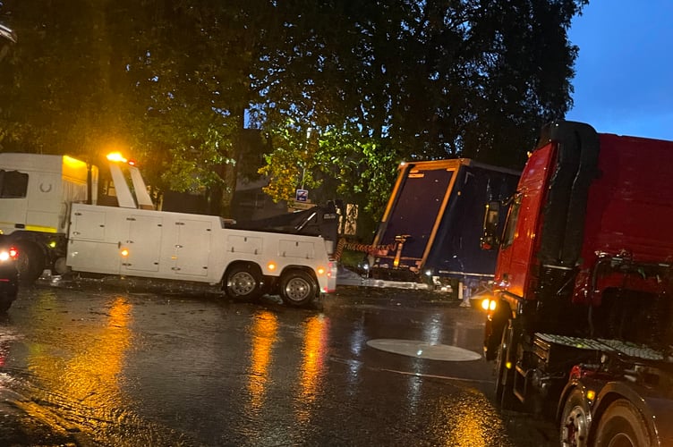 The lorry trailer being reversed along Belle Parade and up Jockey Hill by the specialist vehicle transporter.
