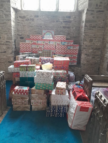 The shoe boxes of items in Coldridge Church which will be going to Bulgaria. 