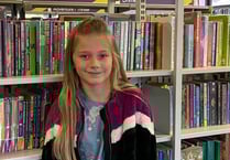 Bookworm Mila reads 100 books on Secret Book Quest
