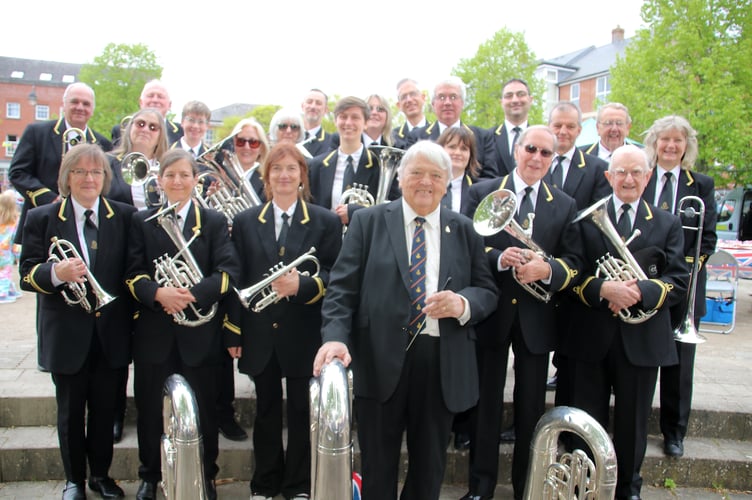 Musical Director Christopher Taylor with members of Crediton Town Band. AQ 0708