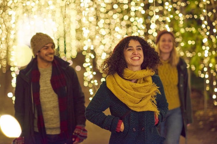 Visitors enjoy the Glow illuminations at RHS Garden Wisley.
