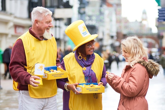 Kate Harding collects for the Great Daffodil Appeal 2020.
Pictured l-r: Nigel Harding (husband), Kate Harding and Amelie Pradel (niece).
This was a campaign mock-up to be used for the GDA campaign 2020.
