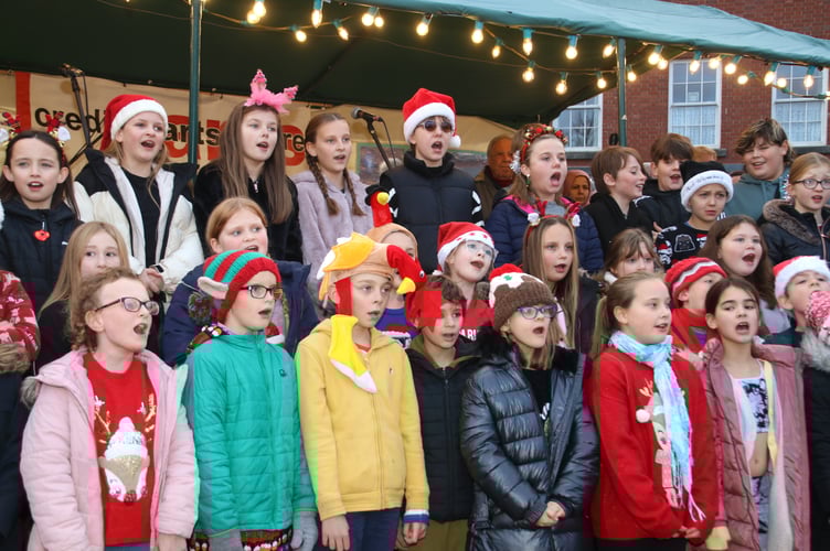 Children singing at Christmas in Crediton Lights Switch-On. 
AQ 3007
