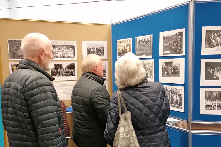 Viewing pictures at the Crediton Museum Exhibition on November 25.