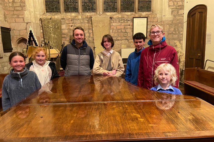 The Junior Choristers with Jon Rawles, Director of Music.
