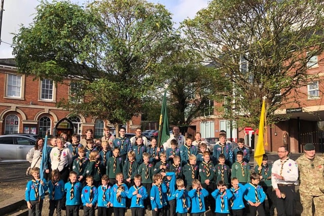 1st Crediton Scouts during Remembrance in Crediton Town Square.