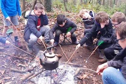 Around the campfire.