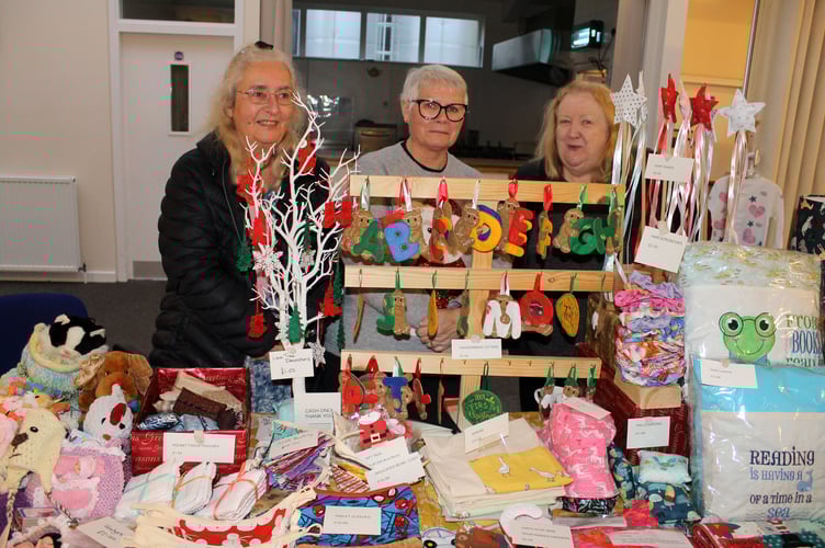 Three friends, Christine Wills, Alice Deaton and Sue Stevens had a stall selling their knitted and crochet items and sewn and machine embroidery items. AQ 0030